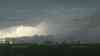 (Unwetteraufzug extrem) Beinahe Tornado durch heftige Rotation von Gewitterwolken: Superzelle mit Wallcloud im Zeitraffer, spektakulärer Unwetteraufzug
