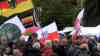 Großdemo - über 10.000 Menschen demonstrieren in Gera am Tag der Einheit in Thüringen: über 10.000 Menschen ziehen durch Gera am Feiertag gegen die Regierung, anstatt die deutsche Wiedervereinigung zu feiern, viele Russlandfahnen wehen im Wind: Polizei mit Großaufgebot vor Ort, Kräfte aus Sachsen-Anhalt unterstützen in Gera